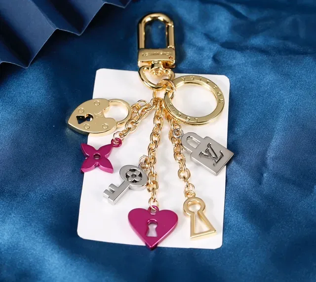 Louis Vuitton Lock & Key Gold Pink Multi-Charm Enamel-Accented Bracelet 3