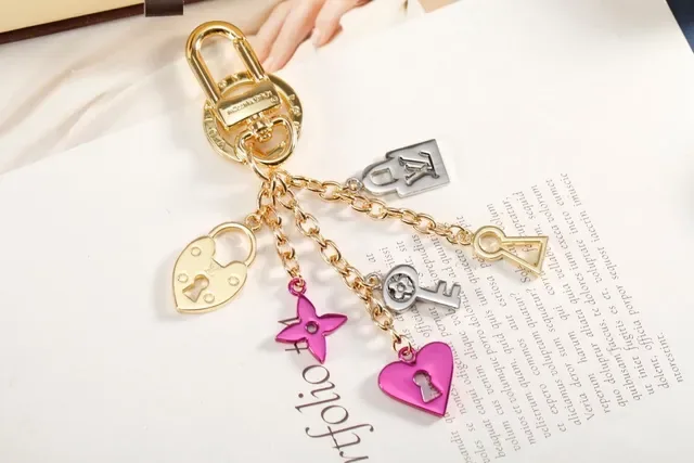 Louis Vuitton Lock & Key Gold Pink Multi-Charm Enamel-Accented Bracelet 9
