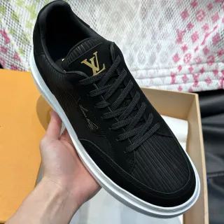 Louis Vuitton LV Trainer Zapatillas lifestyle negras con textura ribeteada dorada Monogram