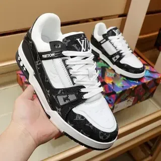 Louis Vuitton LV Trainer Negro Blanco Monogramado Textil Cuero Contraste Zapatillas Lifestyle