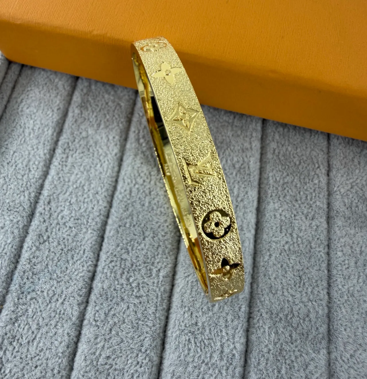 Louis Vuitton Monogram Engraved Bracelet Gold Silver Textured Metallic Surface Bracelet 3