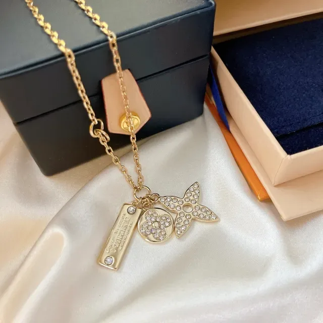 Louis Vuitton Monogram Flower and Star Charm Gold-Tone Crystal Necklace 3