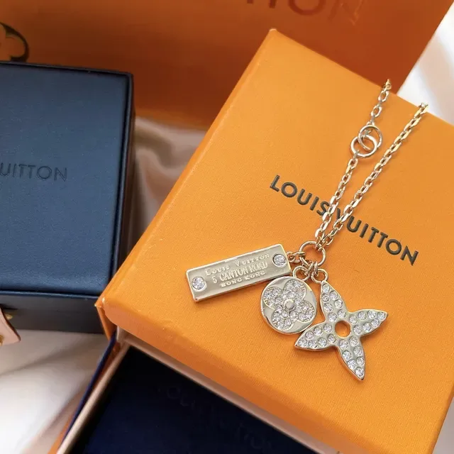Louis Vuitton Monogram Flower and Star Charm Gold-Tone Crystal Necklace 4