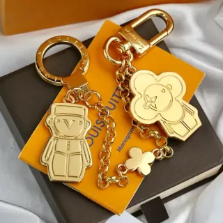 Louis Vuitton Monogram Flower and Vivienne Bear Gold Metal Engraved Phone Case