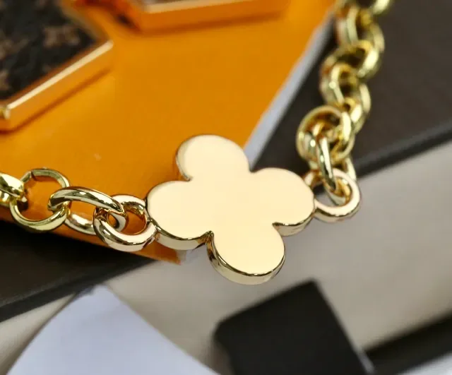 Louis Vuitton Monogram Flower and Vivienne Bear Gold Metal Engraved Phone Case 8