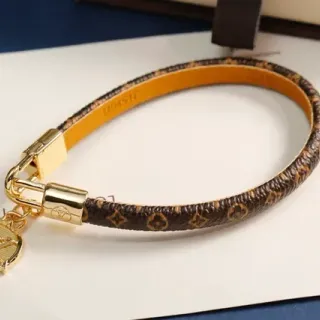 Louis Vuitton Monogram سواري جلد بني ذهبي نسيج مضفر