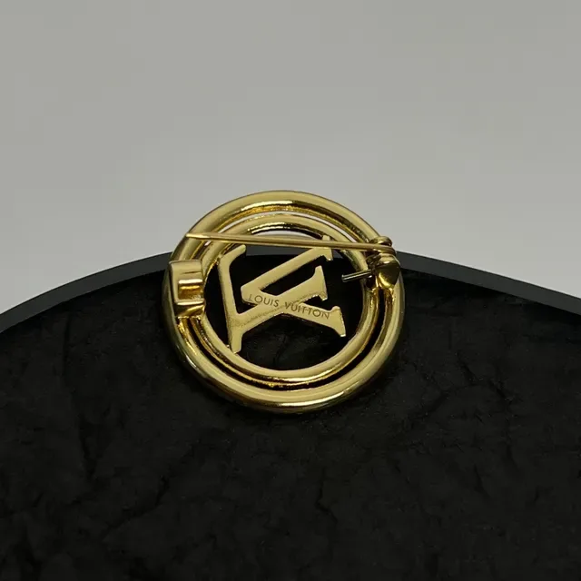 Louis Vuitton Monogrammed Gold-Tone Circular Brooch 2