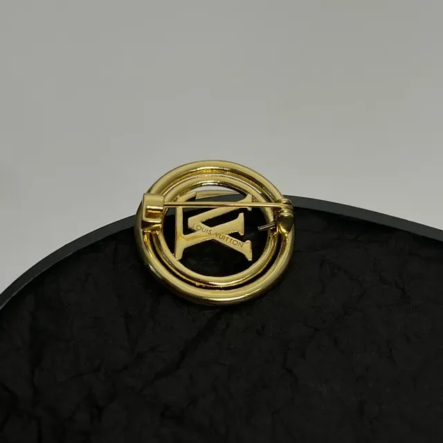 Louis Vuitton Monogrammed Gold-Tone Circular Brooch 3