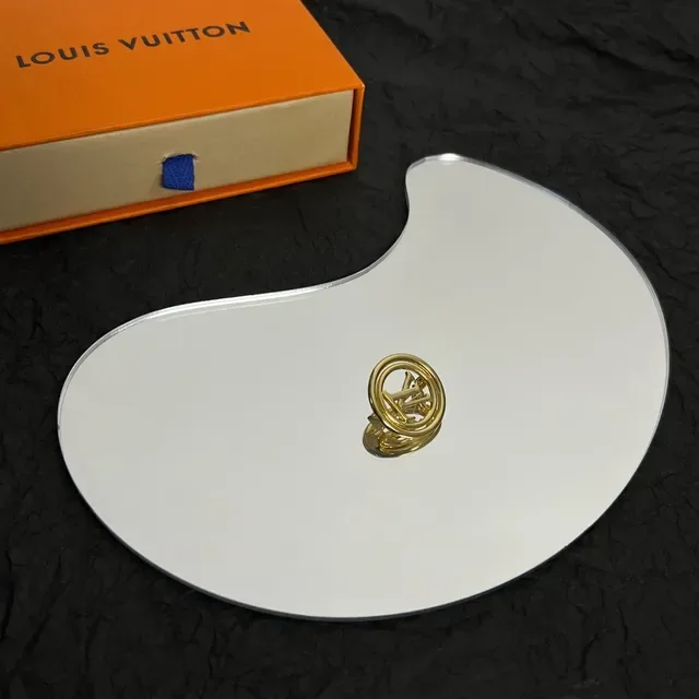 Louis Vuitton Monogrammed Gold-Tone Circular Brooch 6