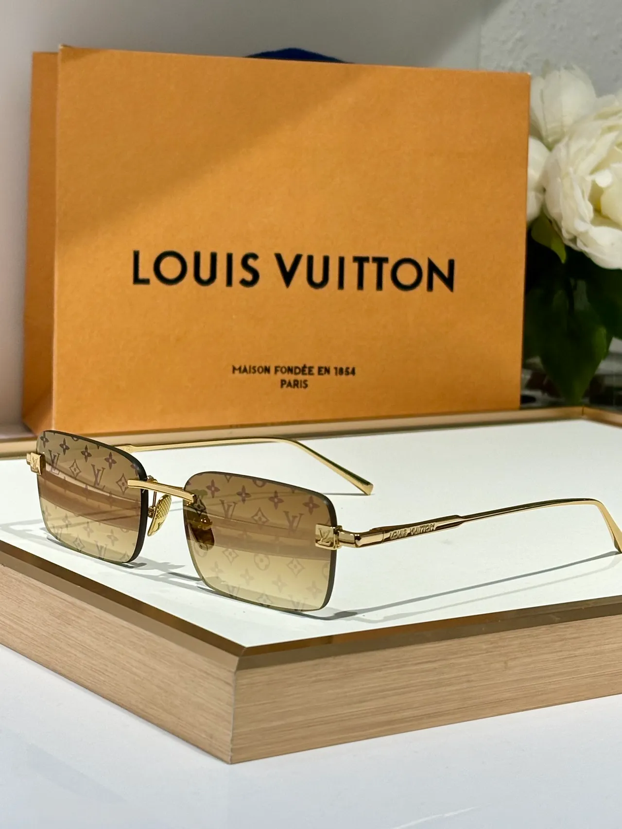 Louis Vuitton Monogrammed Lens Rectangular Rimless Sunglasses 8