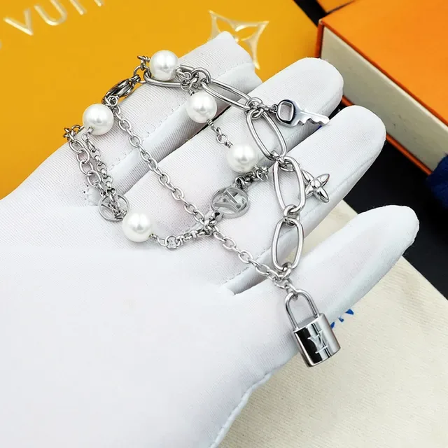 Louis Vuitton Multi-Charm Pearl and Monogram Silver Bracelet 5