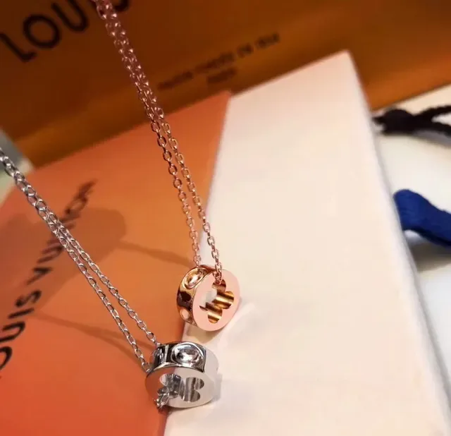Louis Vuitton Silver Gold Monogram-Cutout Pendants Circular Charm Necklace 8