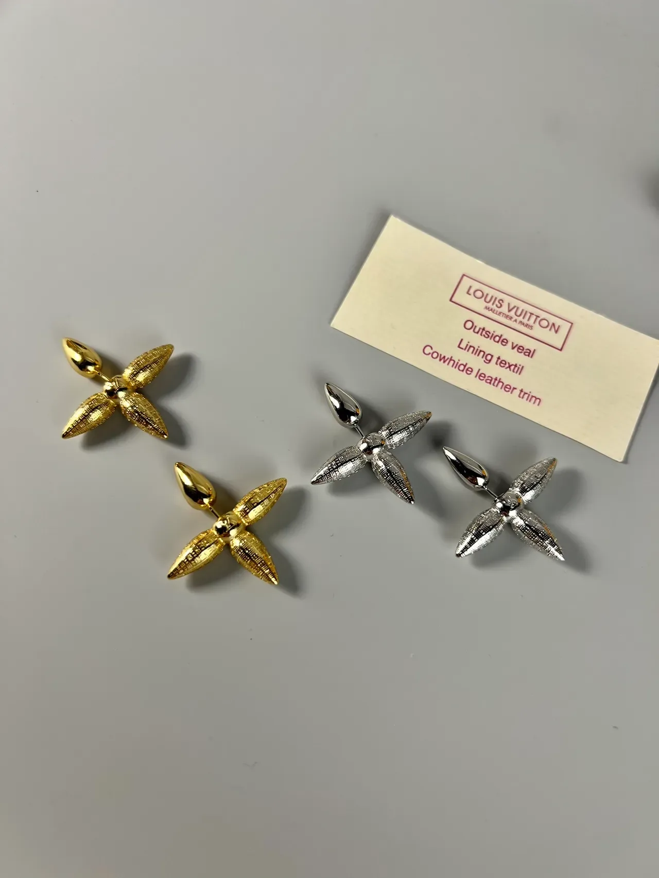 Louis Vuitton Silver Spiked Four-Pointed Earrings 3