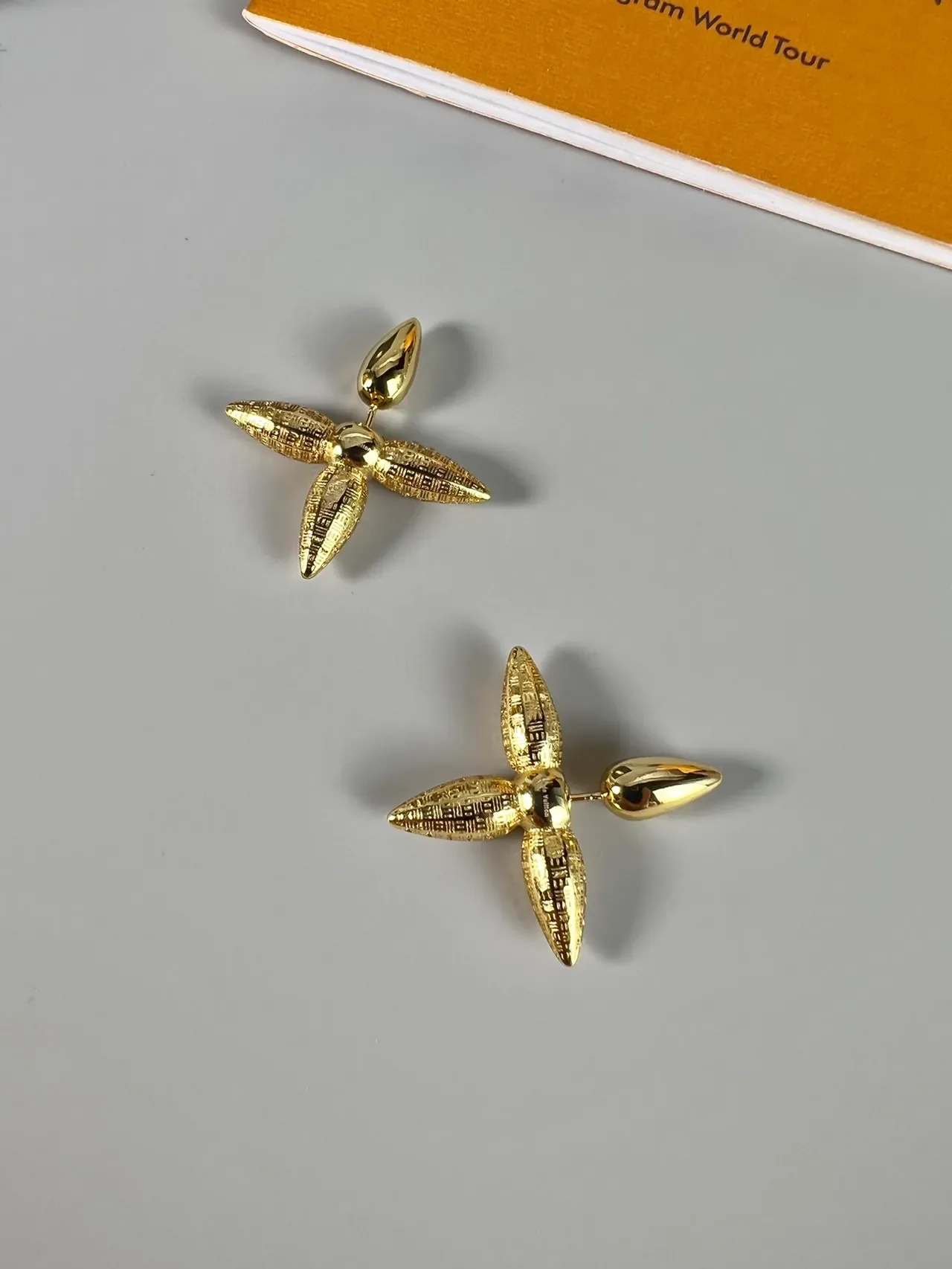 Louis Vuitton Silver Spiked Four-Pointed Earrings 7