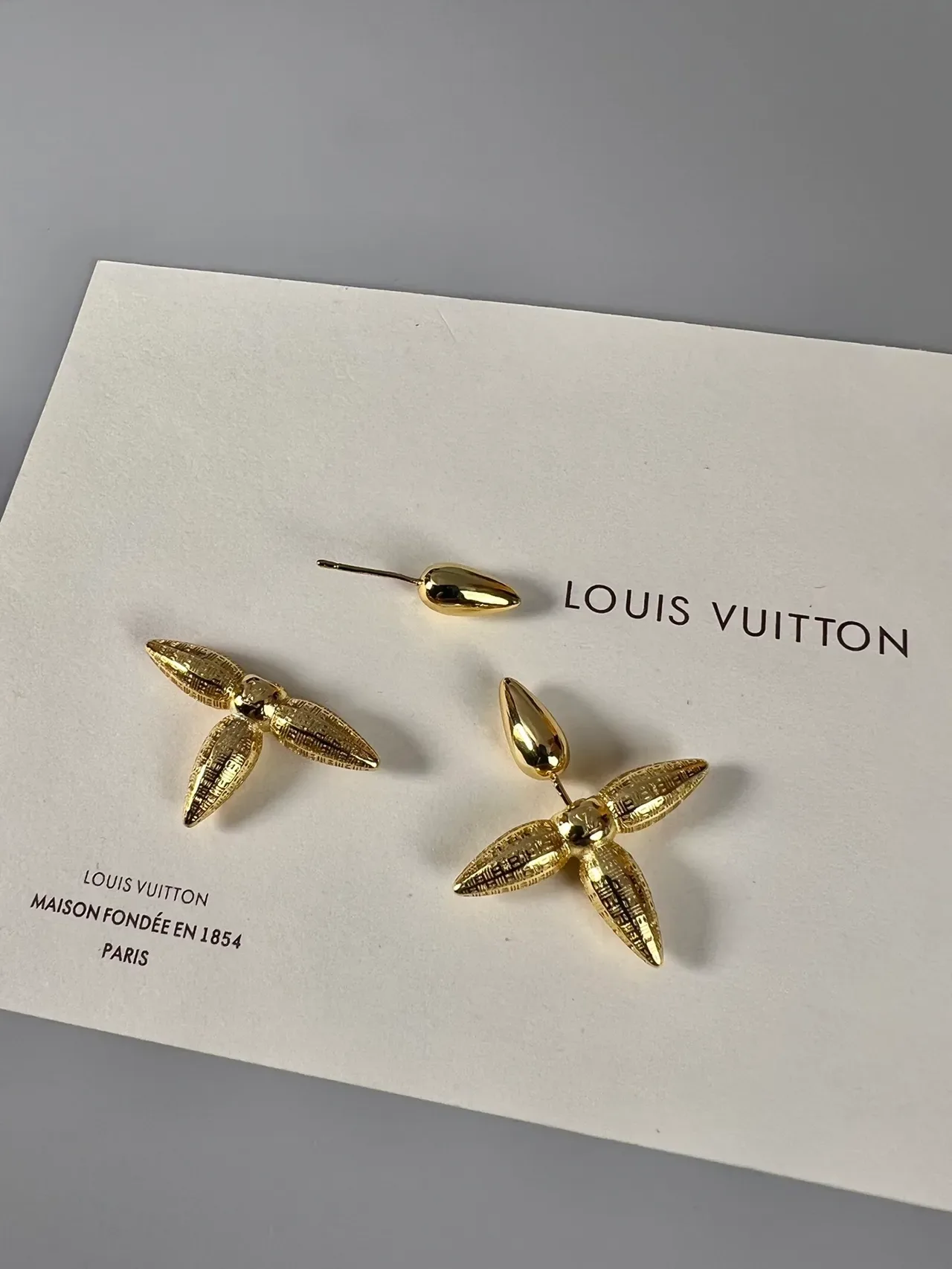 Louis Vuitton Silver Spiked Four-Pointed Earrings 8