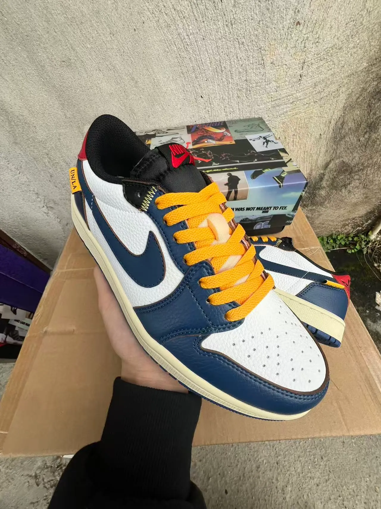 Nike Air Jordan 1 Low Navy White Cream Orange Lifestyle Sneakers 2