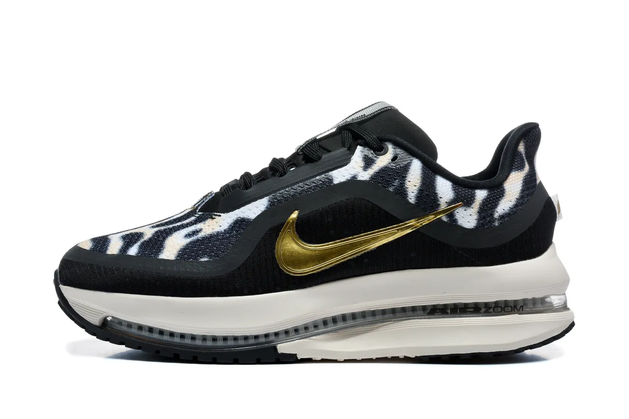 Chaussures de course Nike noir et or imprimé zébré en textile supérieur Swoosh métallique 2