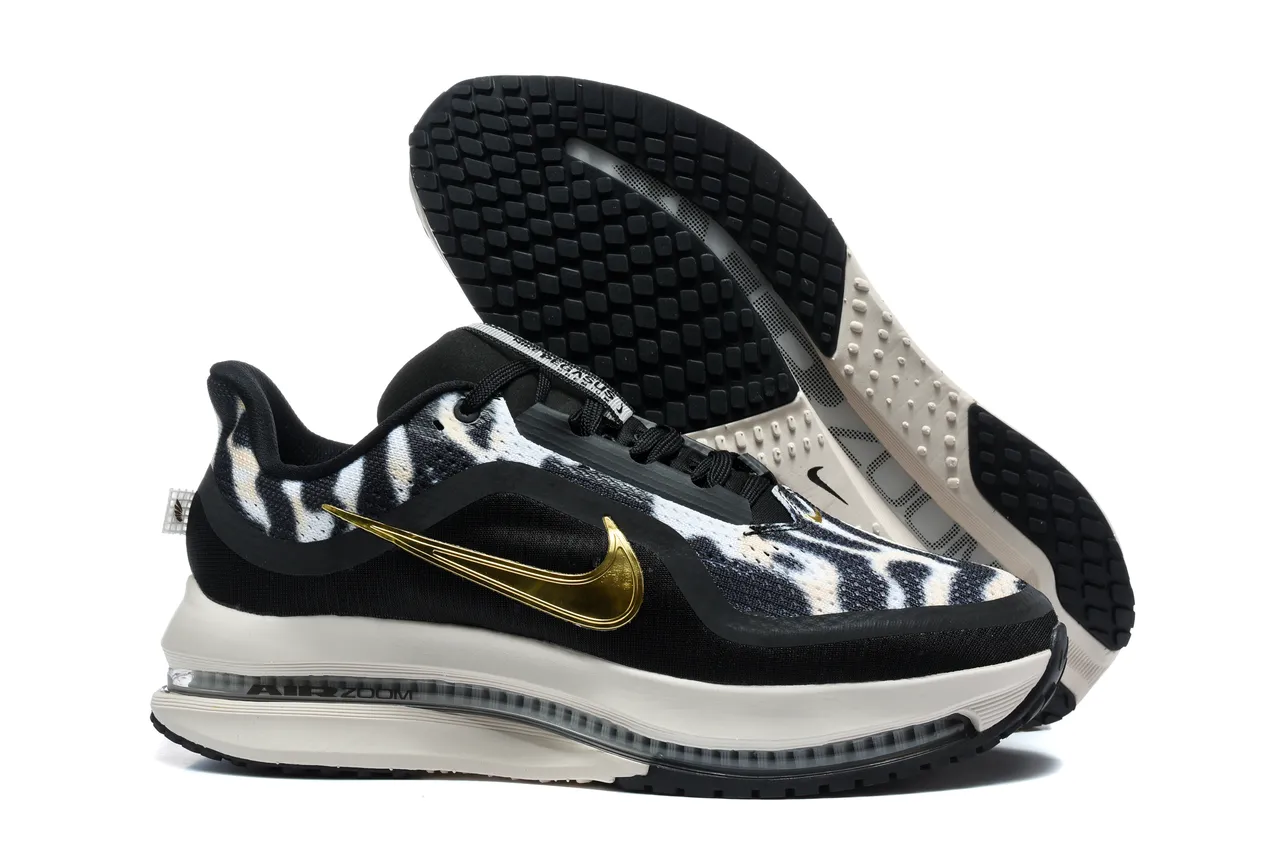 Chaussures de course Nike noir et or imprimé zébré en textile supérieur Swoosh métallique 5