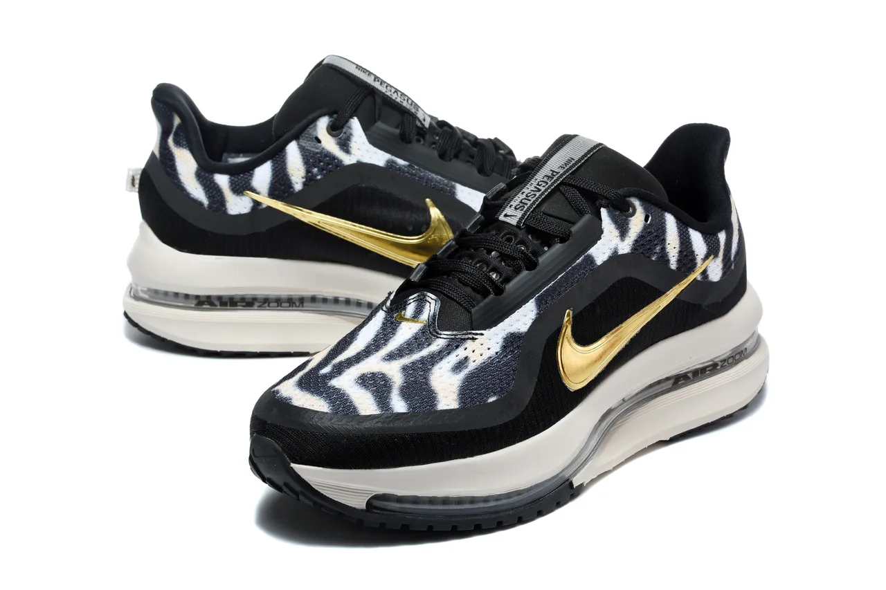 Chaussures de course Nike noir et or imprimé zébré en textile supérieur Swoosh métallique 6