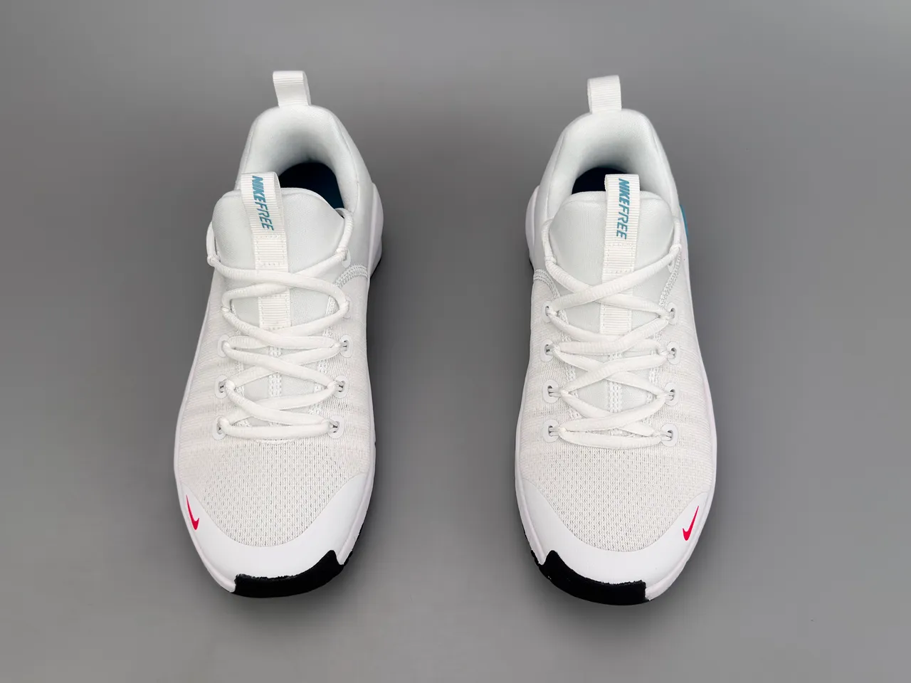 Nike Free RN chaussures de course avec upper en knit blanc et rouge, semelle segmented flex groove 7
