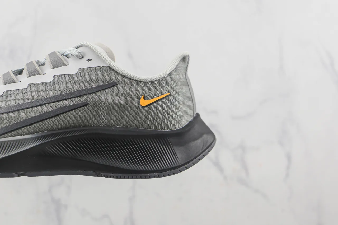 Nike Gray Orange Engineered Mesh Upper Asymmetrical Lace Guard Running Shoes 7
