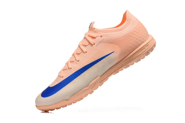 Nike Zapatillas de fútbol turf con upper de knit naranja y azul silueta low-cut 4