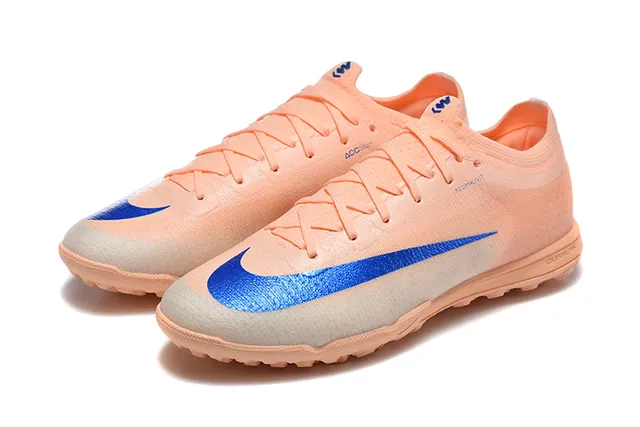 Nike Zapatillas de fútbol turf con upper de knit naranja y azul silueta low-cut 8