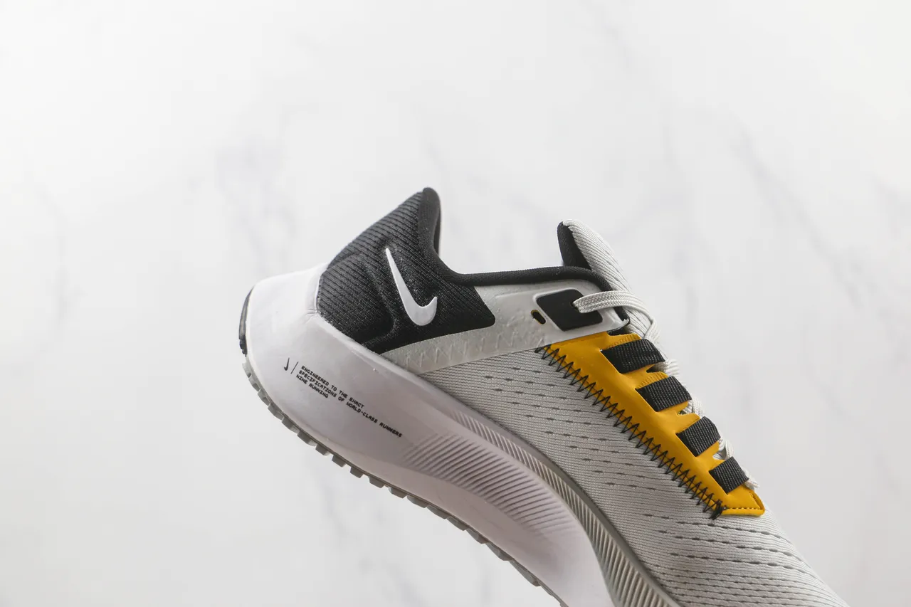 Nike White Black Breathable Engineered Mesh Upper Sculpted Ridged Midsole Running Shoes 5