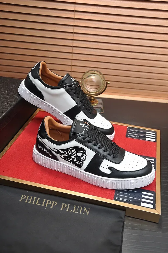 Philipp Plein Sneakers lifestyle noir blanc graphique crâne et flamme semelle intermédiaire estampée branding 5
