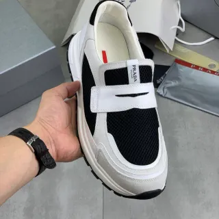 Prada Cloudbust أحذية رياضية نمط حياة سوداء وبيضاء شبكية سليب أون