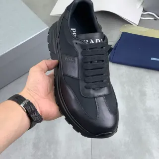Prada Cloudbust Sneakers Lifestyle Noir Cuir et Textil Logo Embossé Lateral