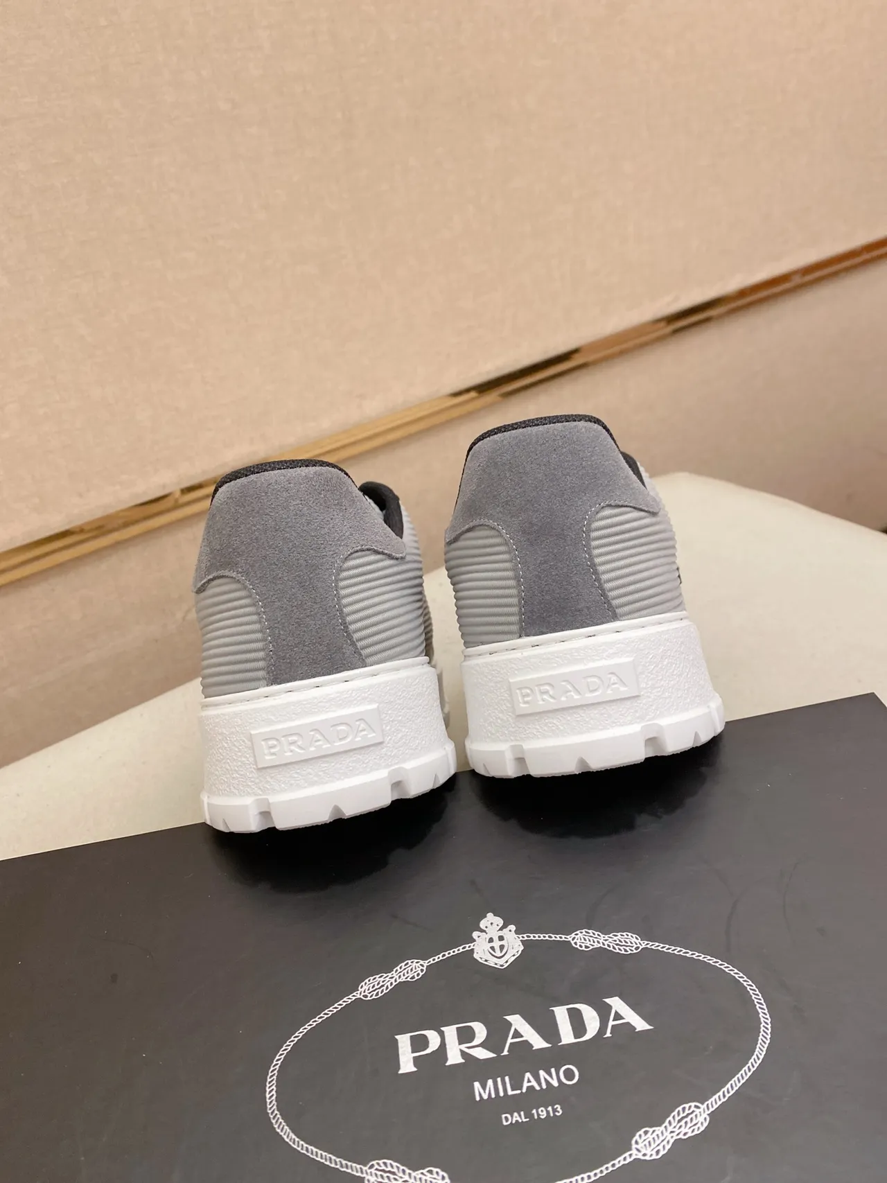 Prada Cloudbust Gray White Ribbed Nylon Upper Triangular Metal Logo Plaque Lifestyle Sneakers 3