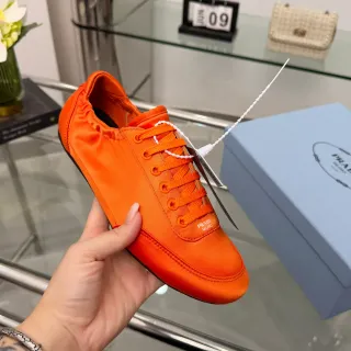 Prada Cloudbust Zapatillas Lifestyle Naranja Blanco Acabado Satinado Parte Superior Cuello Elástico