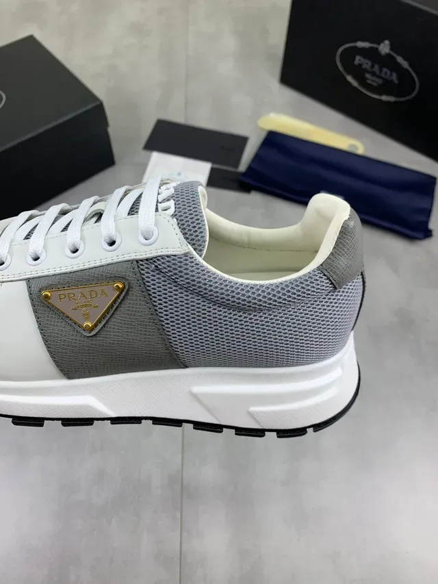 Prada White Gray Mesh And Leather Paneling Triangular Metal Logo Plaque Chunky Sneakers 3