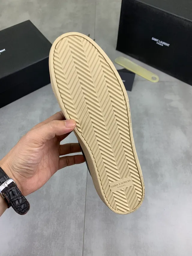 Saint Laurent Sneakers Lifestyle Noir Beige en Cuir avec Embossage de Marque 2
