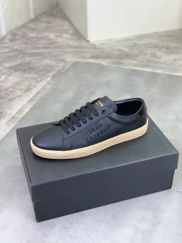 Saint Laurent Sneakers Lifestyle Noir Beige en Cuir avec Embossage de Marque 4