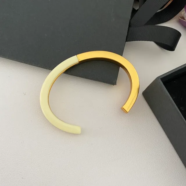 Saint Laurent Bracelet en forme de C en émail et doré de deux tons 7