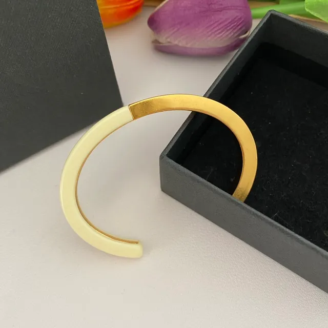 Saint Laurent Bracelet en forme de C en émail et doré de deux tons 8
