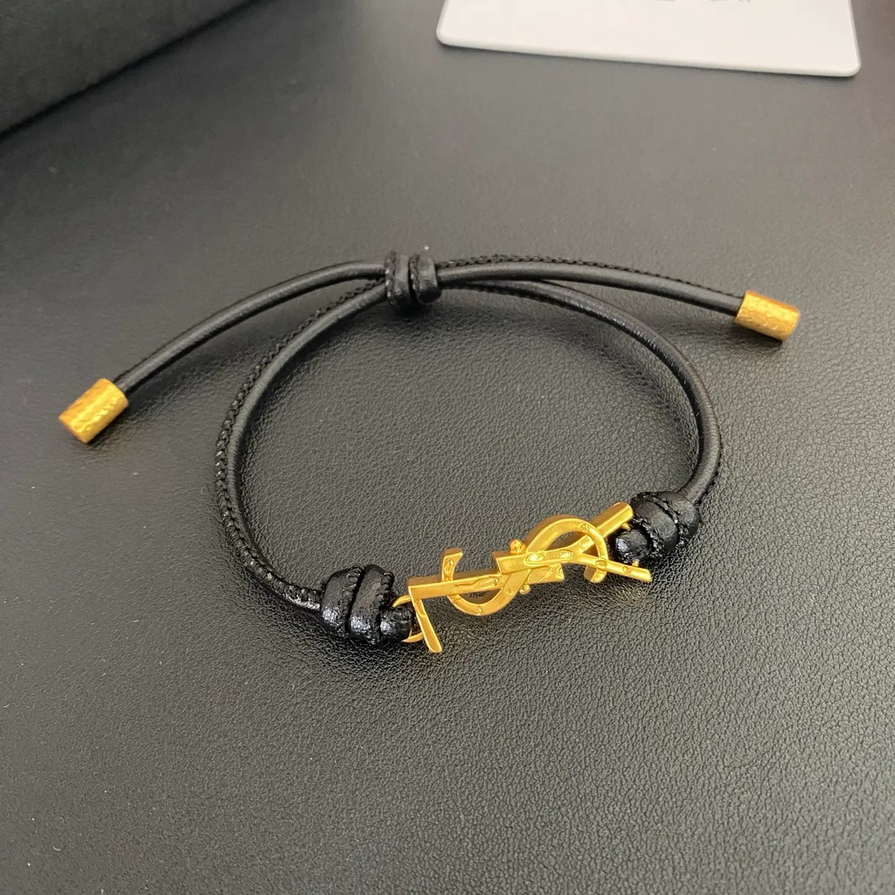 Saint Laurent YSL Monogram Preto Marrom interligado encanto cordão ajustável construção pulseira 6