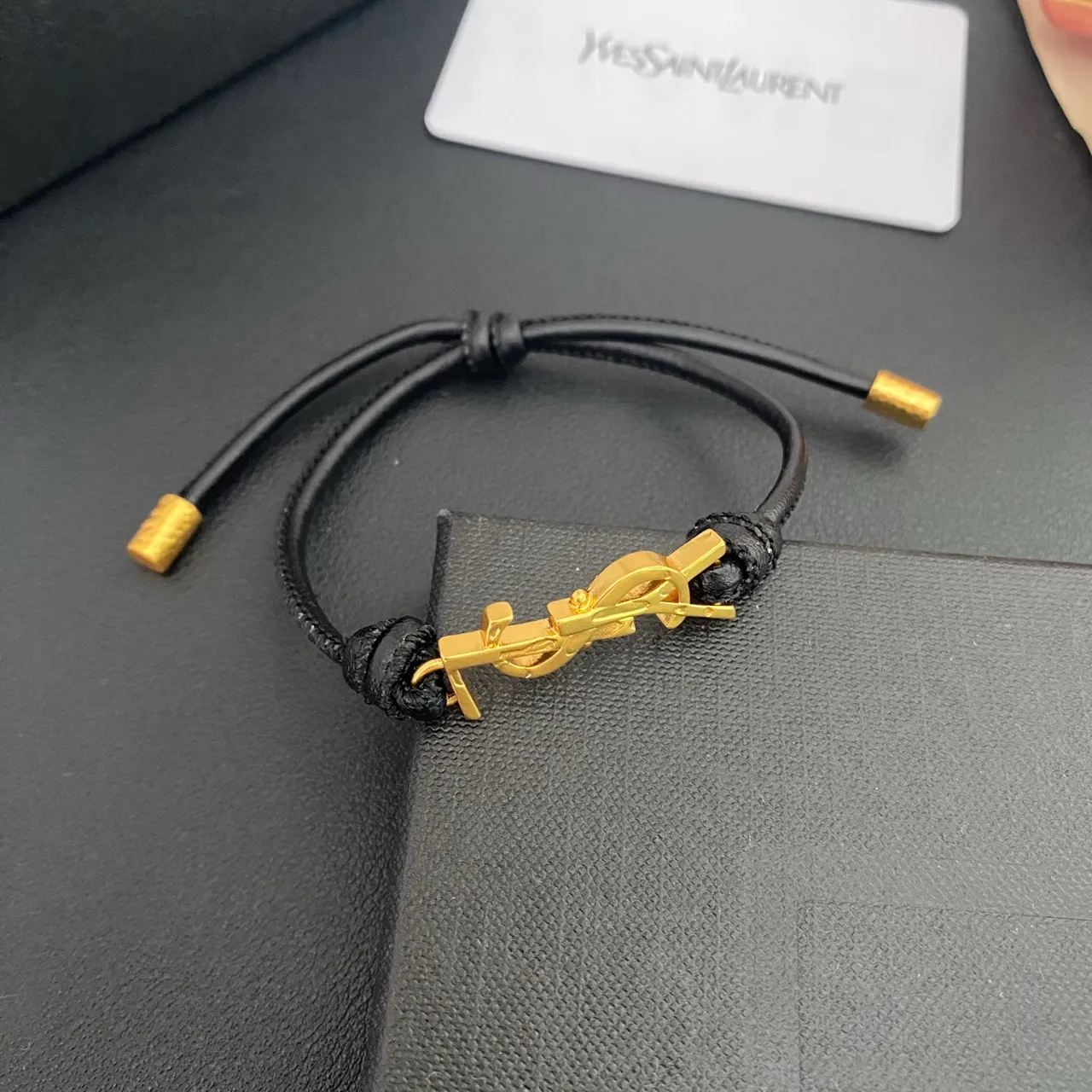 Saint Laurent YSL Monogram Preto Marrom interligado encanto cordão ajustável construção pulseira 8