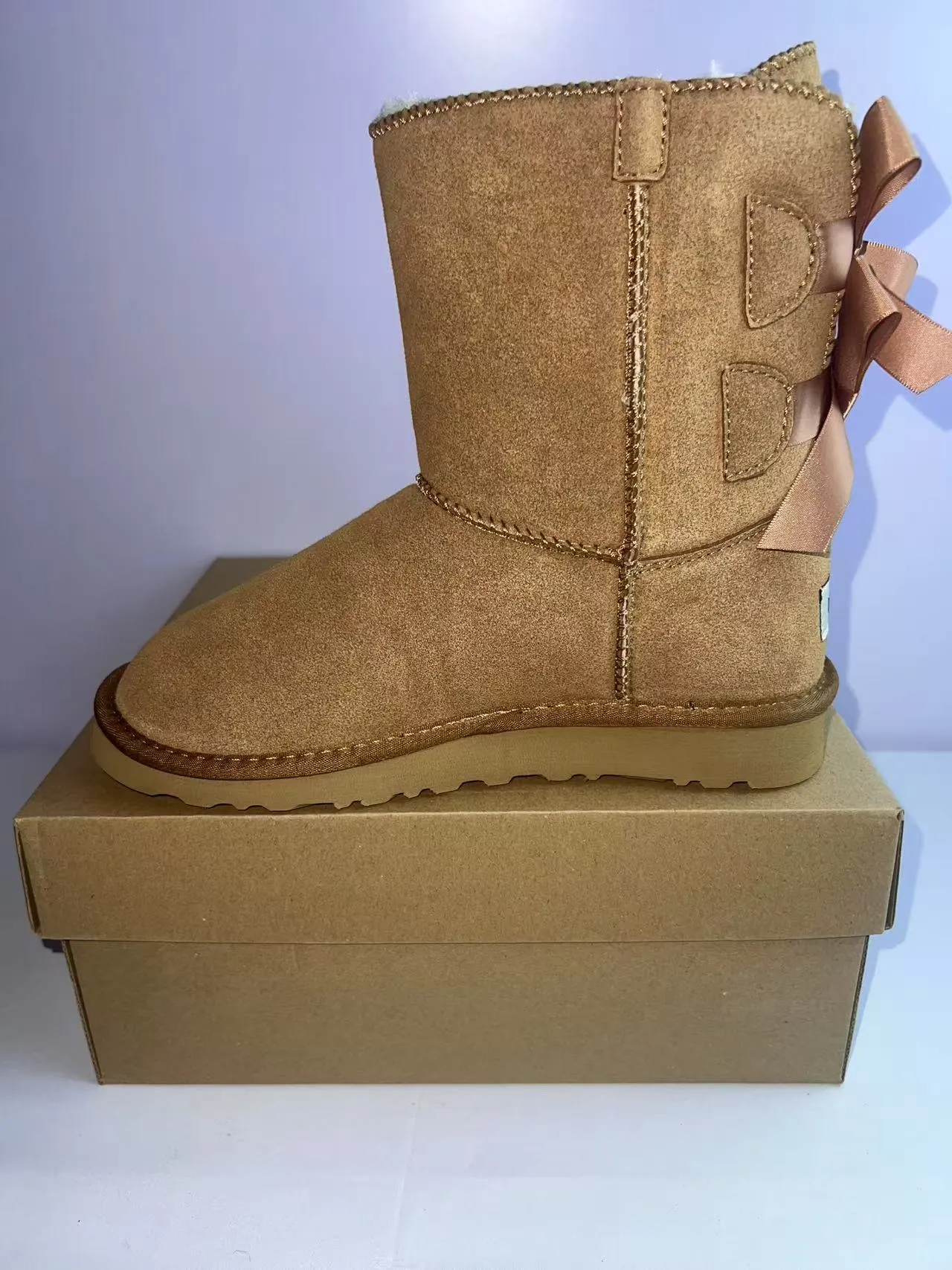 UGG Tasman Rose Gold Bow Snow Boots 3