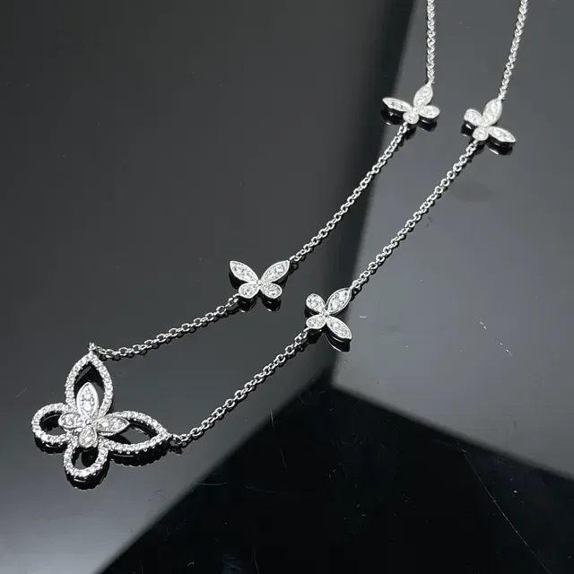 Van Cleef & Arpels Colar de prata branca com motivos florais Pavé-Set graduados 4