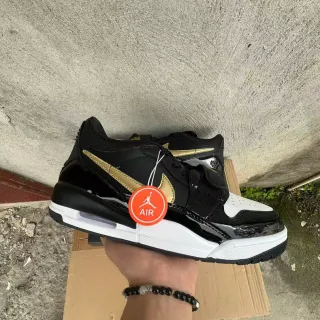 Air Jordan Black Gold Patent Leather Swoosh Overlay Sneakers