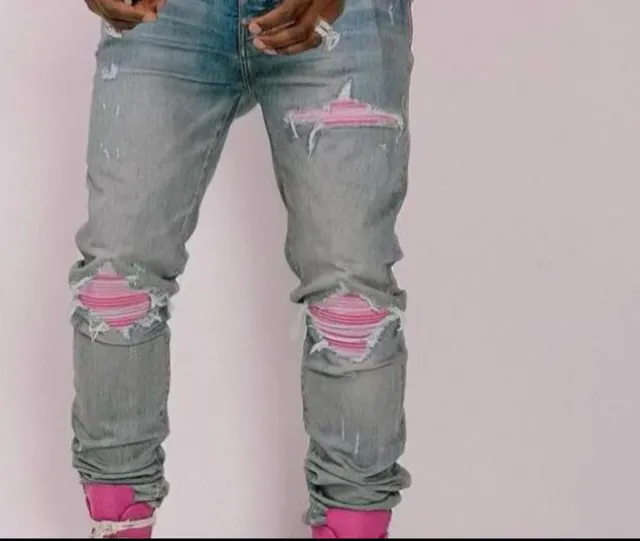 Amiri Distressed Patchwork Light-Wash Blue Jeans 2