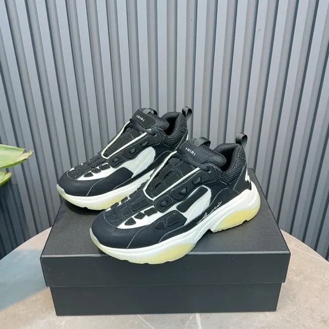Amiri Skel Top Noir Blanc Jaune pâle baskets à semelle épaisse 7