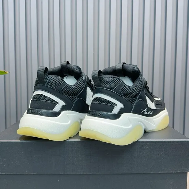 Amiri Skel Top Noir Blanc Jaune pâle baskets à semelle épaisse 9