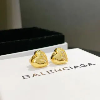 Balenciaga Pendientes metálicos dorados y plateados con forma de corazón esculpida