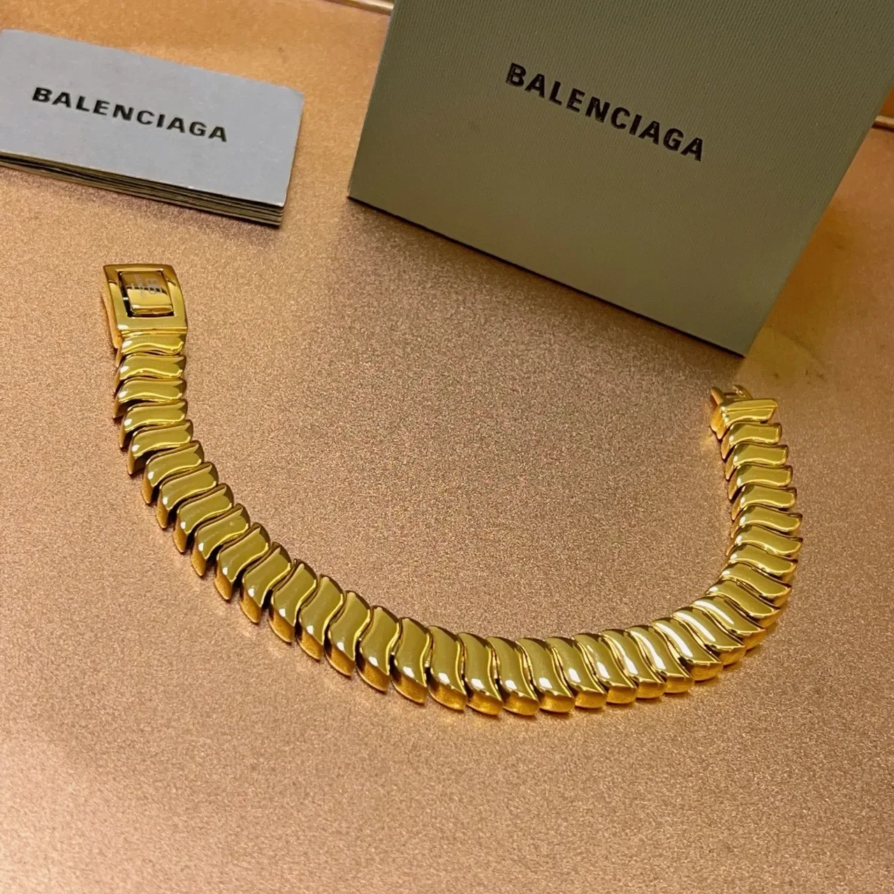 Balenciaga Bracelet à maillons articulés ton doré 6