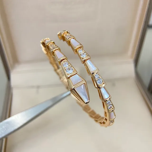 Bvlgari Bracelet Or et Argent Articulé Rigide à Maillons Segments Géométriques Coniques 5