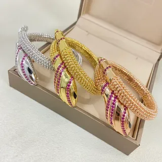 Bvlgari Serpenti सोने का गुलाबी सांप घुमावदार पावे सेट रूबी कंगन